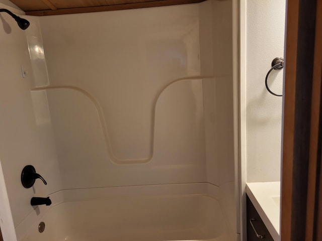 bathroom featuring vanity and washtub / shower combination