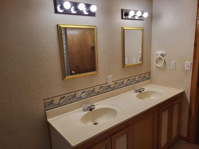 bathroom featuring tile patterned flooring and vanity