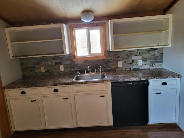 kitchen featuring black dishwasher, sink, tasteful backsplash, and white cabinetry