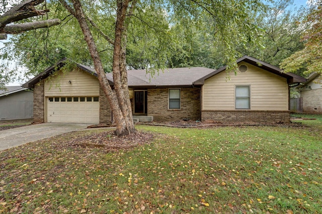 single story home with a front yard and a garage