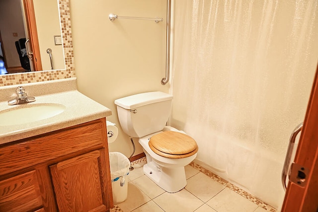 full bathroom with vanity, tile patterned flooring, toilet, and shower / tub combo with curtain