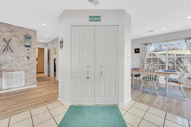 foyer entrance featuring light wood-type flooring