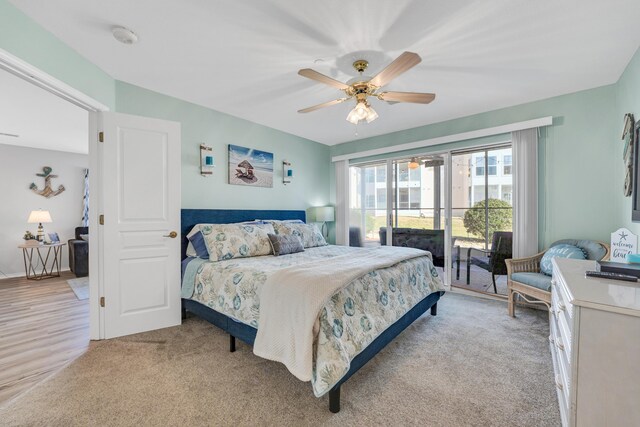 215 Meadow Brook Ln Unit 1, Branson, MO 65616 - bedroom featuring light carpet, a ceiling fan, and access to exterior