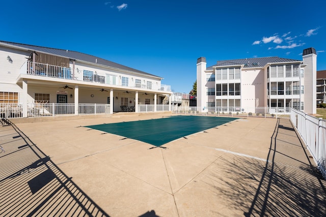 215 Meadow Brook Ln Unit 1, Branson, MO 65616 - pool featuring fence, a patio, and ceiling fan
