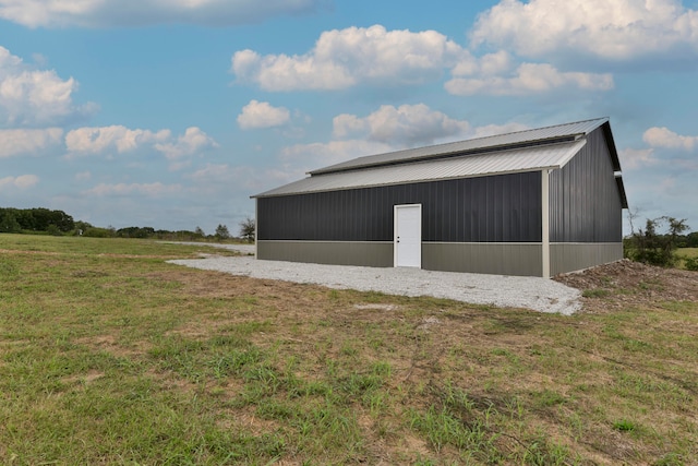 garage with a lawn