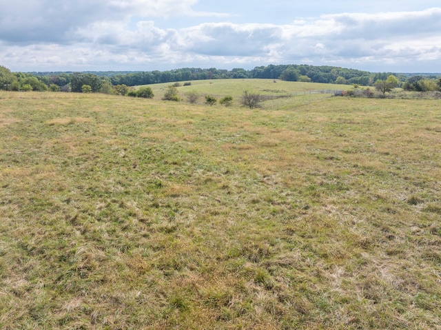 exterior space with a rural view