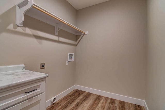 162 Mountain View Cir, Branson West, MO 65737 - washroom featuring light wood-style flooring, hookup for an electric dryer, baseboards, washer hookup, and laundry area