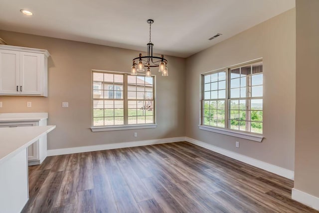 162 Mountain View Cir, Branson West, MO 65737 - unfurnished dining area with visible vents, a wealth of natural light, and dark wood-style flooring