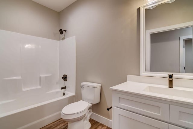 162 Mountain View Cir, Branson West, MO 65737 - full bathroom with wood finished floors, toilet, vanity, baseboards, and shower / bathing tub combination