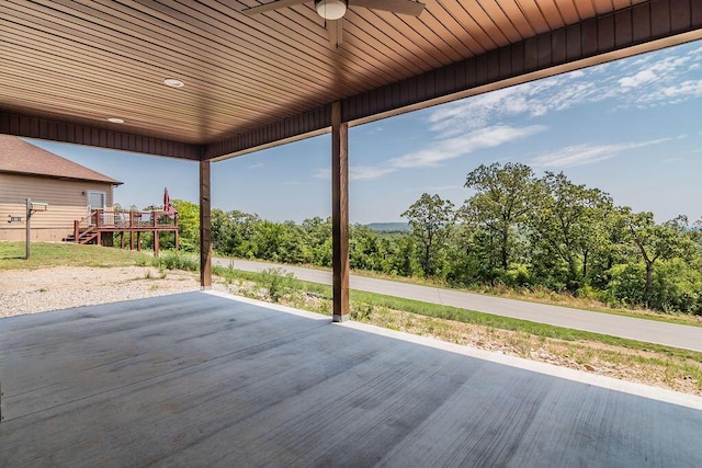 162 Mountain View Cir, Branson West, MO 65737 - wooden terrace with a ceiling fan and a patio