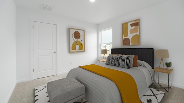 carpeted bedroom featuring baseboards and visible vents