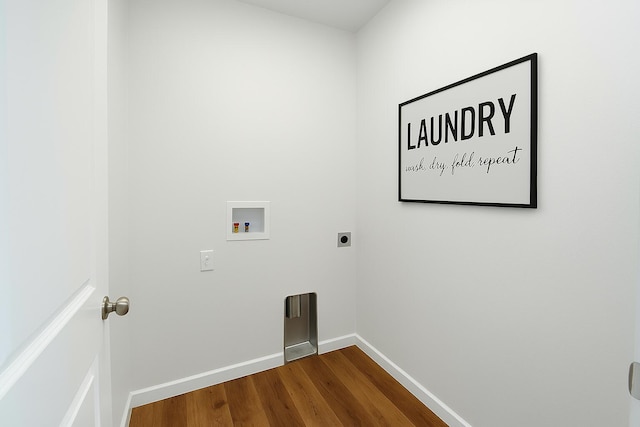 laundry room with hookup for an electric dryer, dark wood finished floors, baseboards, laundry area, and washer hookup