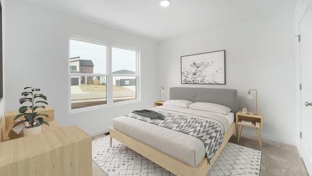 bedroom featuring recessed lighting, baseboards, and light carpet