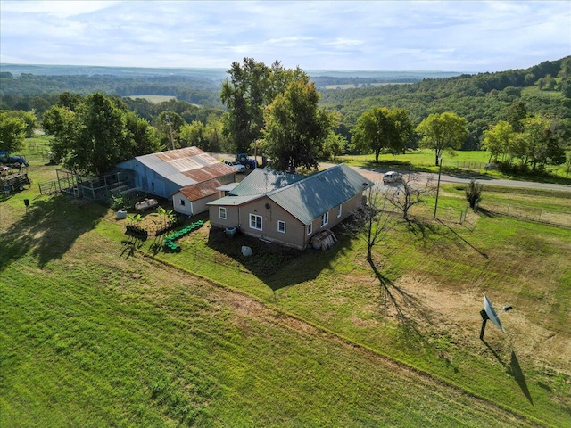 birds eye view of property featuring a rural view