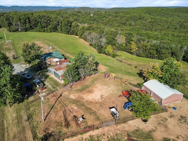 birds eye view of property featuring a rural view