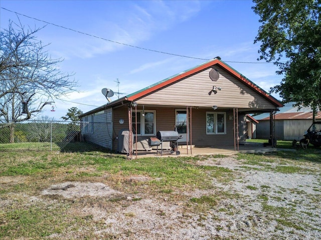 rear view of property with a patio