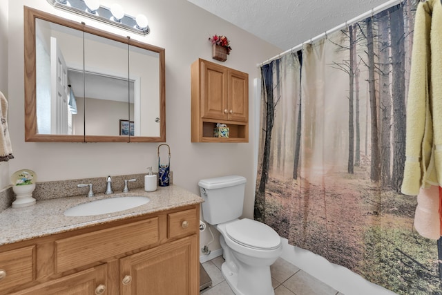 full bathroom featuring vanity, toilet, a textured ceiling, tile patterned flooring, and shower / tub combo with curtain