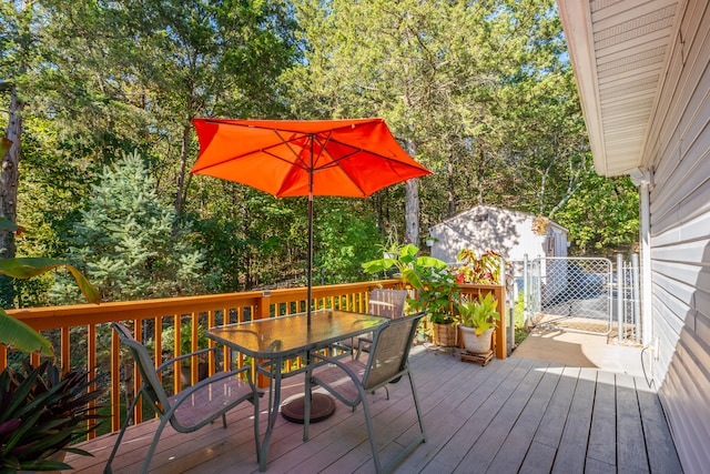 wooden deck with a storage unit