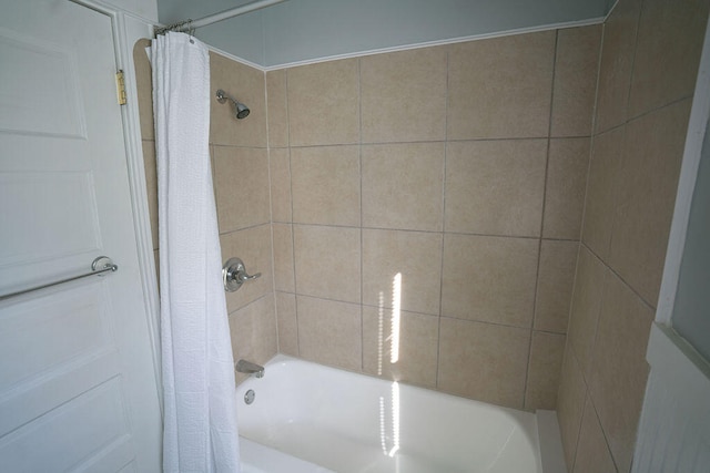 bathroom featuring shower / tub combo with curtain