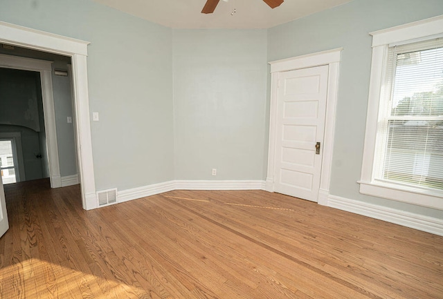 unfurnished room featuring wood-type flooring and ceiling fan