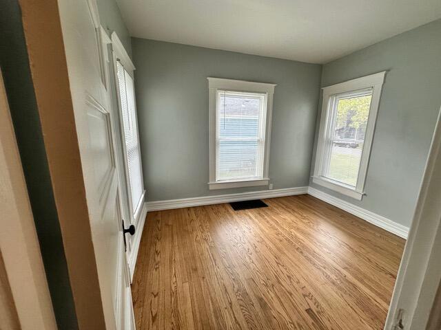 empty room featuring light hardwood / wood-style floors