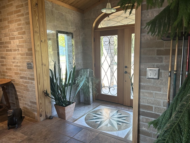 entrance foyer with stone tile floors
