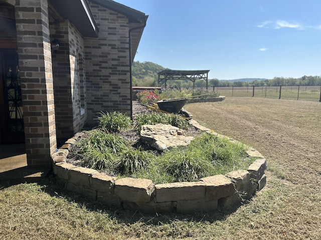 view of yard featuring fence