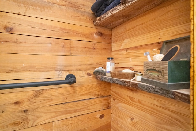 view of sauna with wooden walls