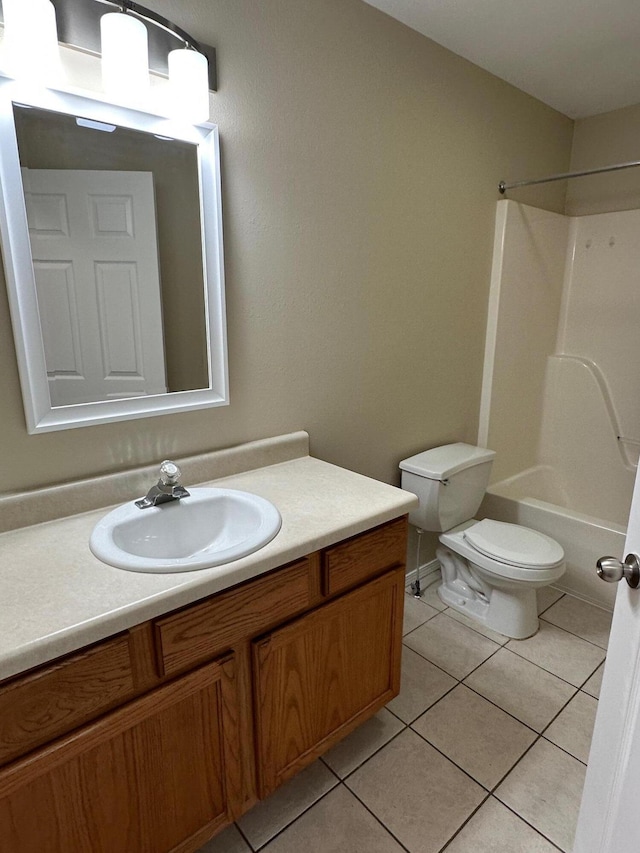 full bathroom with vanity, toilet, shower / washtub combination, and tile patterned floors