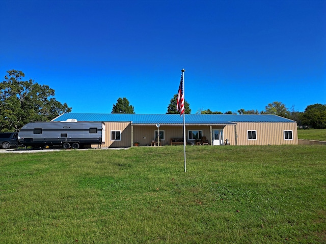 exterior space with a front yard