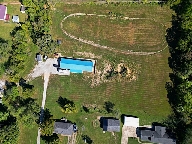 birds eye view of property featuring a rural view