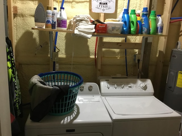 washroom with separate washer and dryer and water heater