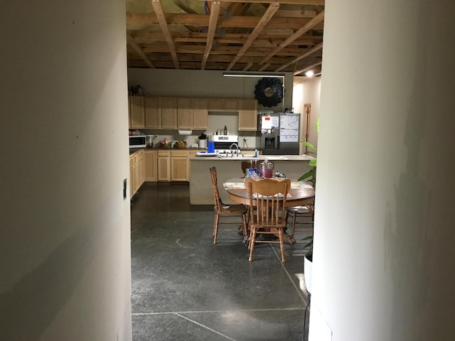 dining space featuring sink