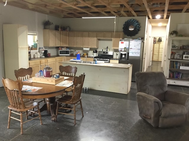 dining space with sink