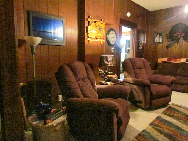 living room with wood walls