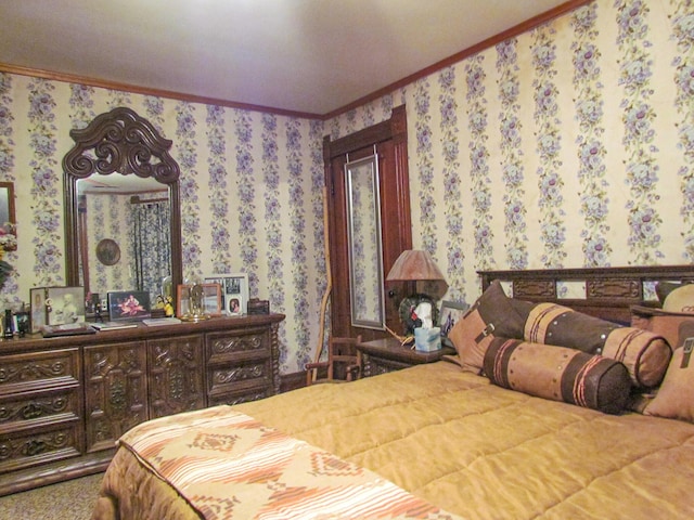 bedroom featuring ornamental molding, carpet flooring, and wallpapered walls
