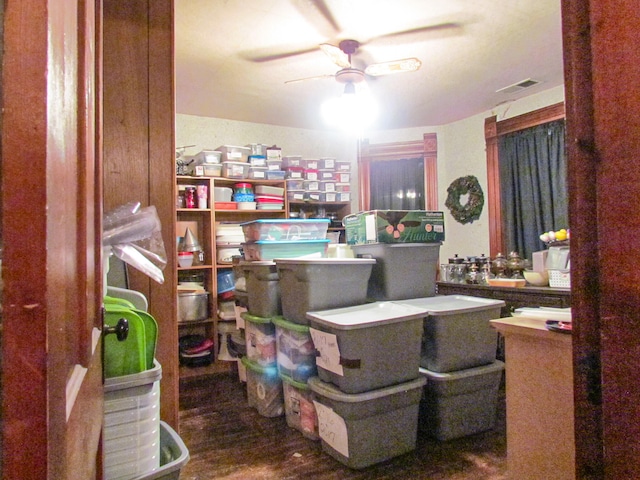 storage area featuring ceiling fan