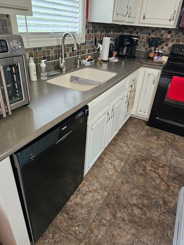 kitchen featuring sink, white cabinetry, decorative backsplash, and black appliances