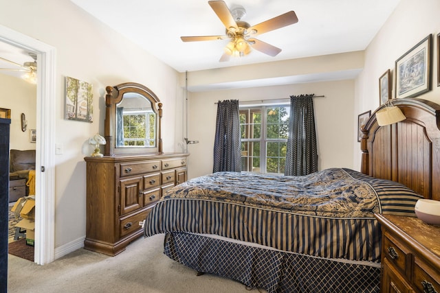 180 Grace Chapel Rd Unit 246, Blue Eye, MO 65611 - bedroom with baseboards, a ceiling fan, light colored carpet, and multiple windows