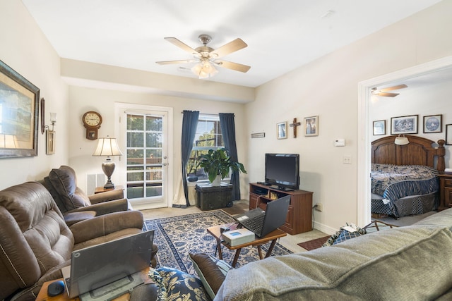 living room with ceiling fan