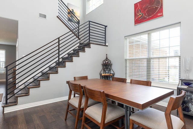 dining room featuring dark hardwood / wood-style flooring