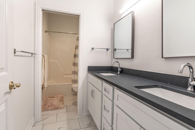 full bathroom with shower / bath combo, vanity, and toilet