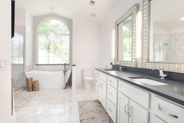 full bathroom featuring lofted ceiling, vanity, toilet, and shower with separate bathtub