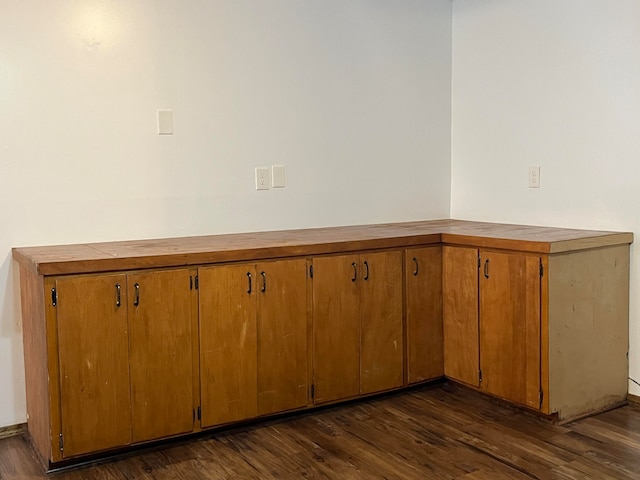 interior space with dark wood-type flooring