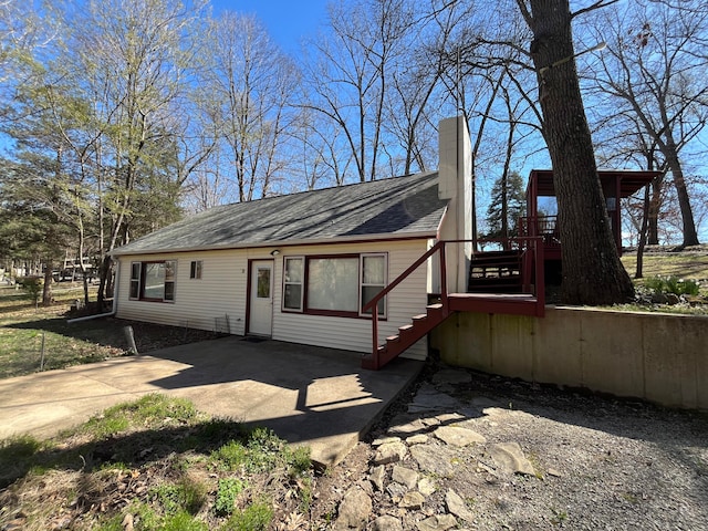 view of front of property with a patio and a deck