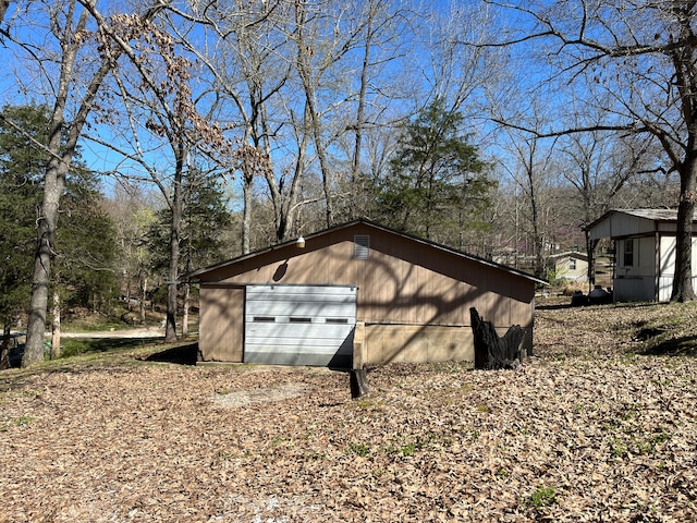 view of outbuilding featuring a garage