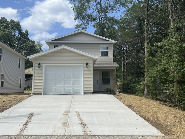 4073 White Oak Lot 4, Merriam Woods, MO 65740 - traditional-style home featuring concrete driveway and an attached garage