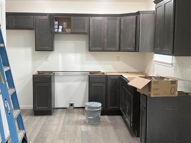 4071 White Oak Rd Lot 5, Merriam Woods, MO 65740 - kitchen featuring light wood-style floors, open shelves, and light countertops