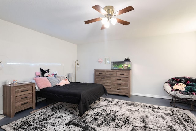160 Mary Ln, Kirbyville, MO 65679 - bedroom with concrete floors, a ceiling fan, and baseboards
