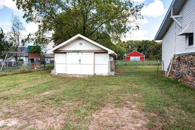 garage featuring a yard